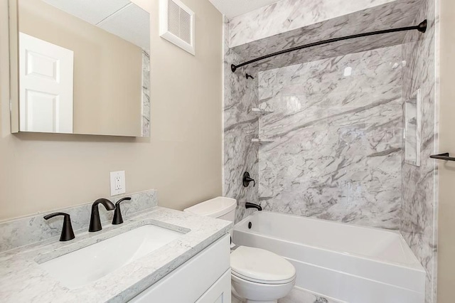 4975 Washington St Unit 313, Boston, MA 02132 - bathroom featuring toilet, washtub / shower combination, and vanity