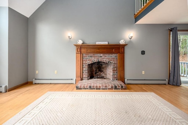 unfurnished living room with high vaulted ceiling, wood finished floors, a brick fireplace, and a baseboard radiator
