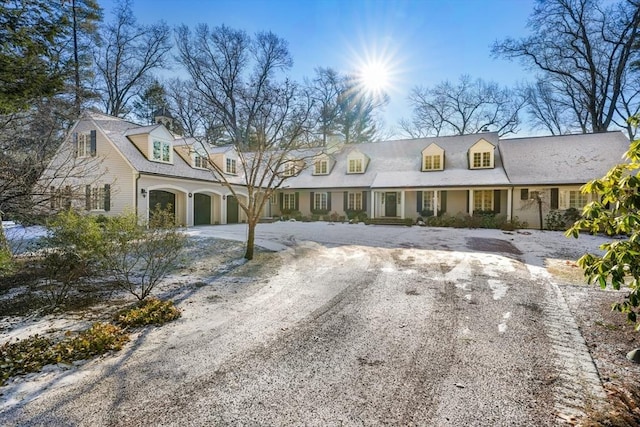 view of front of property with a garage