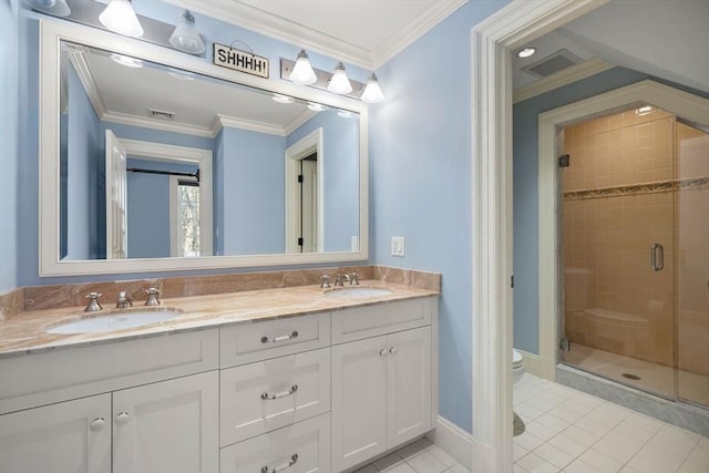 bathroom featuring a shower with door, vanity, ornamental molding, tile patterned floors, and toilet