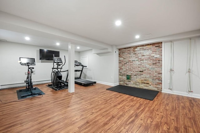 workout room featuring light hardwood / wood-style floors