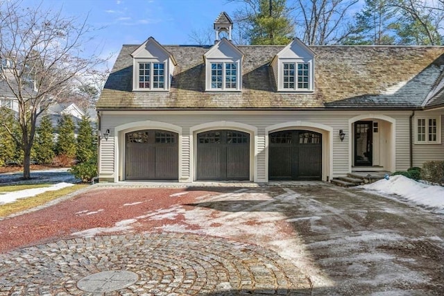 view of front of house with a garage