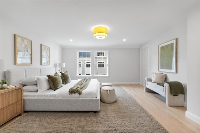 bedroom with light hardwood / wood-style floors