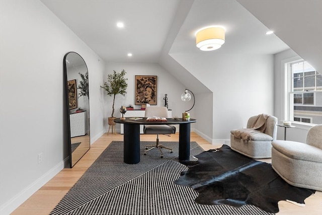 office area with lofted ceiling and light hardwood / wood-style floors