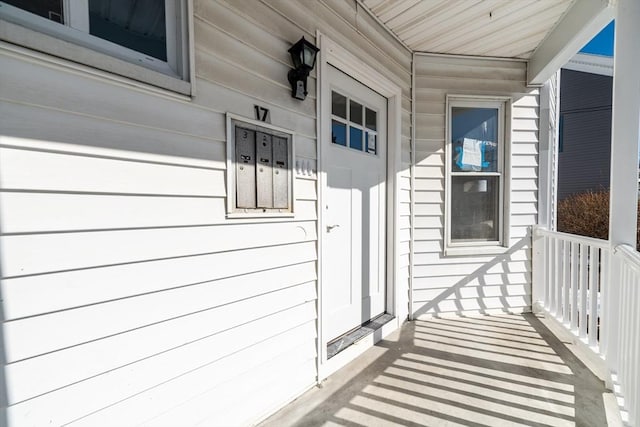 property entrance with a porch