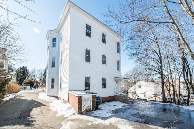 view of snow covered property