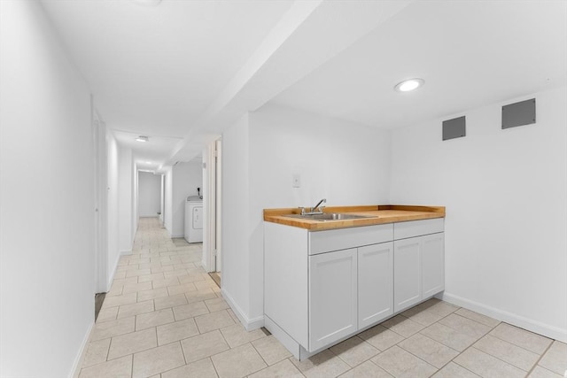 212 Princeton St Unit 1, Boston, MA 02128 - interior space with a sink, light tile patterned floors, and baseboards