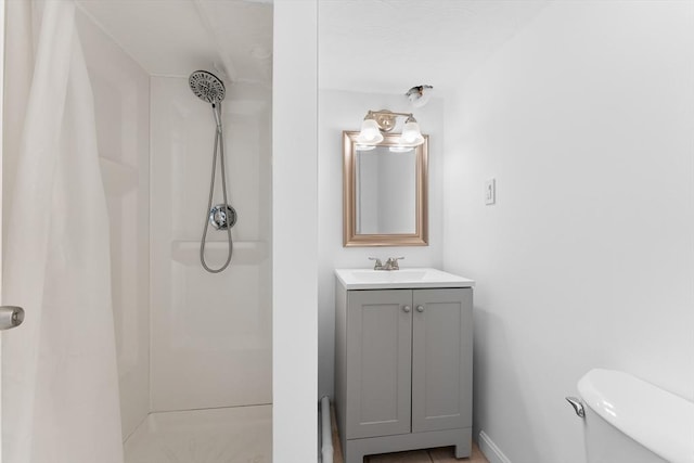 212 Princeton St Unit 1, Boston, MA 02128 - bathroom featuring vanity, baseboards, curtained shower, and toilet