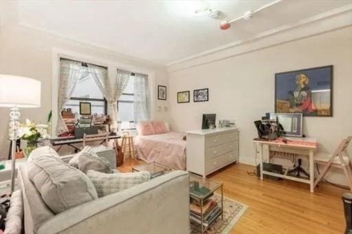 bedroom featuring hardwood / wood-style flooring