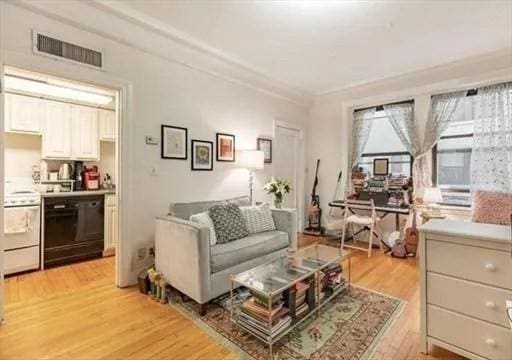 living room with light hardwood / wood-style floors