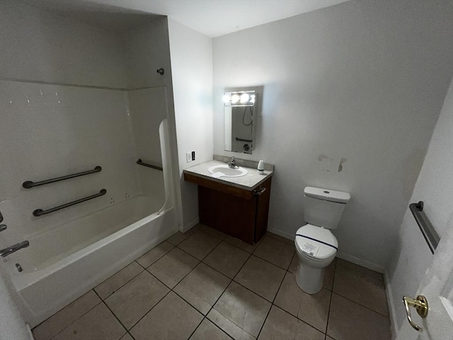 full bathroom featuring vanity, tile patterned floors, toilet, and washtub / shower combination