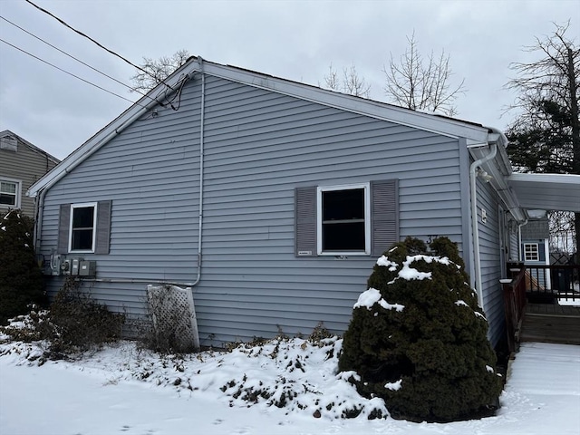 view of snow covered property