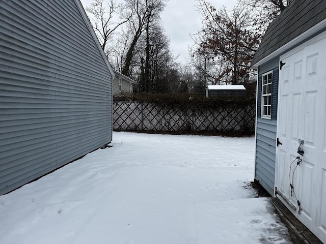 view of yard covered in snow