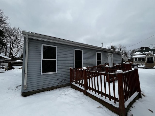 view of snow covered property