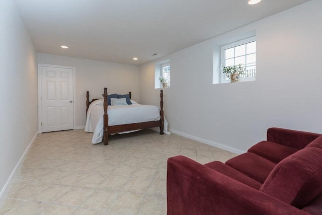 bedroom with baseboards, light tile patterned flooring, and recessed lighting
