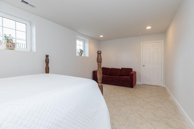 bedroom with recessed lighting, visible vents, and baseboards