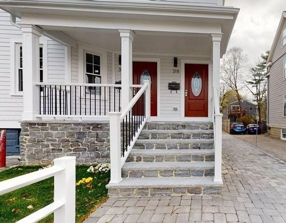 318 Concord Ave Unit 2, Cambridge, MA 02138 - view of exterior entry featuring covered porch