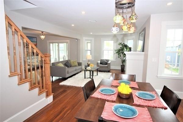 318 Concord Ave Unit 2, Cambridge, MA 02138 - dining room with stairway, healthy amount of natural light, wood finished floors, and recessed lighting