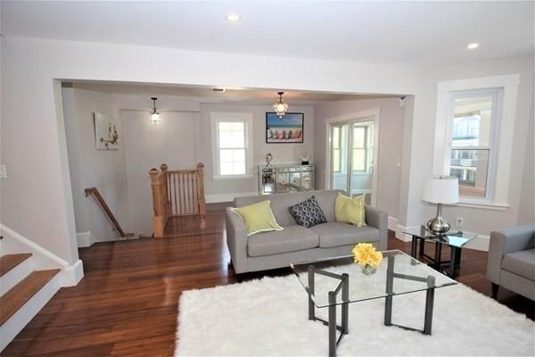 318 Concord Ave Unit 2, Cambridge, MA 02138 - living area featuring baseboards, wood finished floors, and recessed lighting