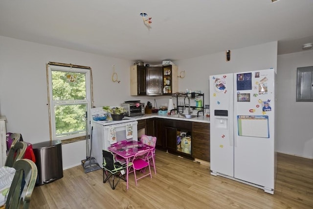 2278-2280 Main St, Palmer, MA 01080 - kitchen with white fridge with ice dispenser, light wood-style floors, light countertops, and dark brown cabinets