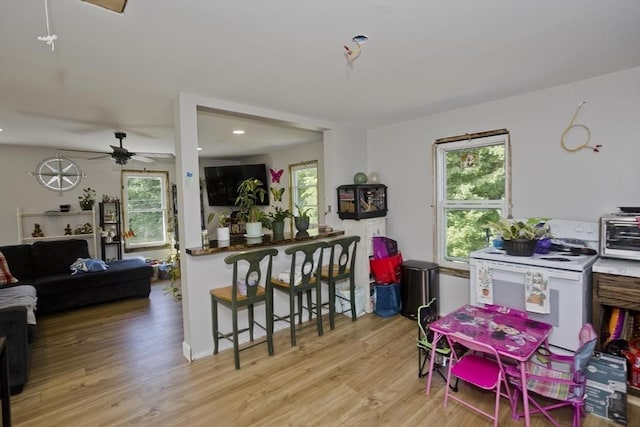2278-2280 Main St, Palmer, MA 01080 - kitchen featuring white electric stove, healthy amount of natural light, a ceiling fan, light wood finished floors, and recessed lighting