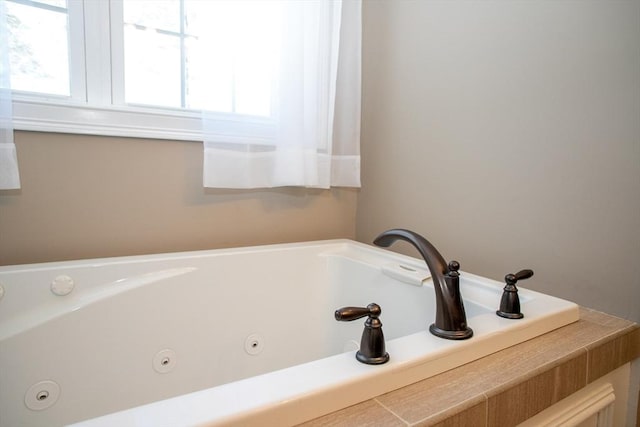 full bath featuring a jetted tub