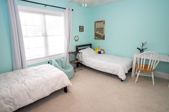 bedroom featuring carpet flooring