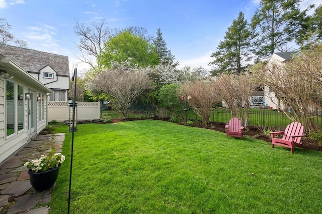 view of yard with fence
