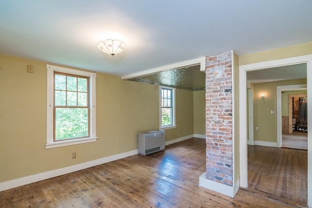43 Meadow St, Northfield, MA 01360 - unfurnished room with wood-type flooring and heating unit
