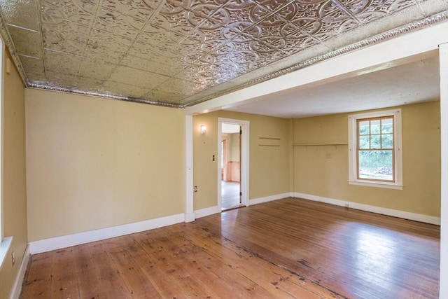 43 Meadow St, Northfield, MA 01360 - unfurnished room featuring an ornate ceiling and wood-type flooring