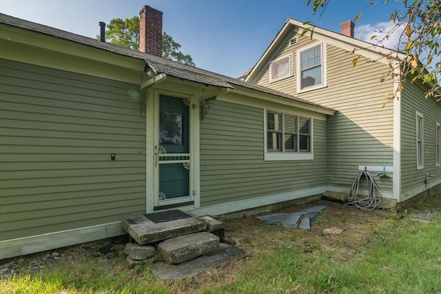 43 Meadow St, Northfield, MA 01360 - rear view of house with a chimney