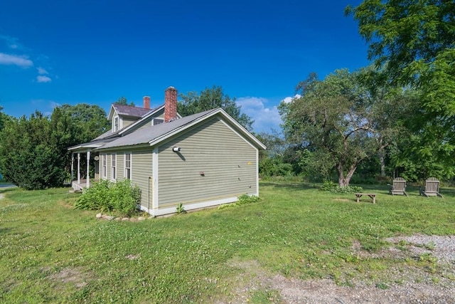 43 Meadow St, Northfield, MA 01360 - view of side of property featuring a lawn and a chimney