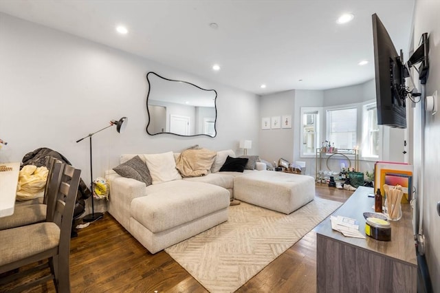 living room featuring dark wood-style floors and recessed lighting