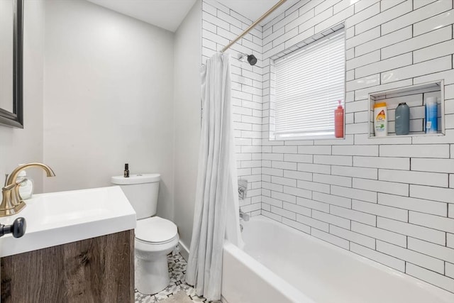 full bath featuring toilet, shower / tub combo, vanity, and baseboards