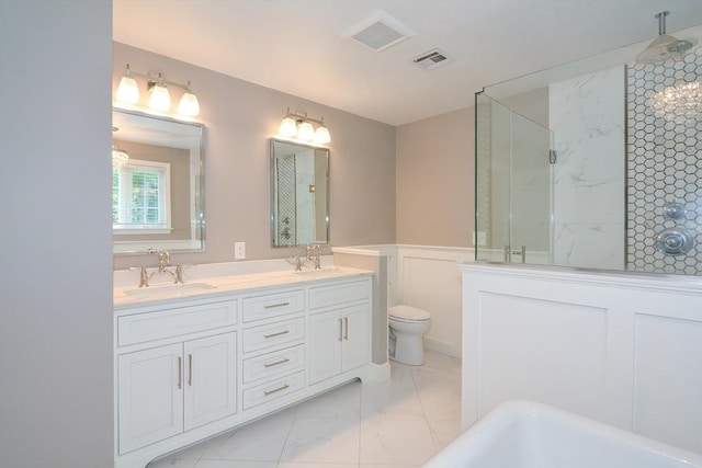 full bath featuring marble finish floor, visible vents, a walk in shower, and a sink