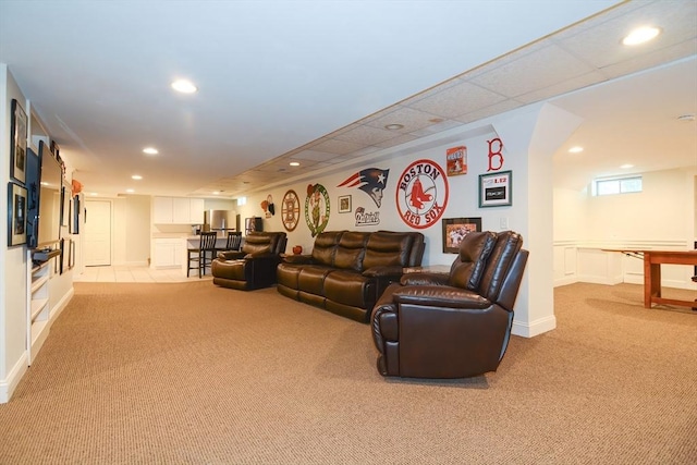 living room featuring recessed lighting and light colored carpet