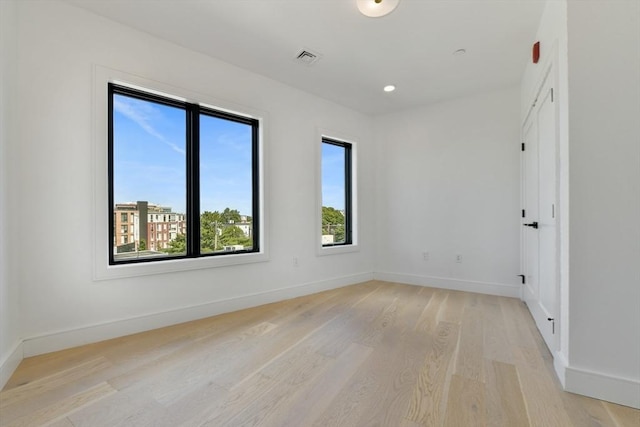 50 Leo M Birmingham Pkwy Unit 501, Boston, MA 02135 - unfurnished room with light wood-style flooring and baseboards