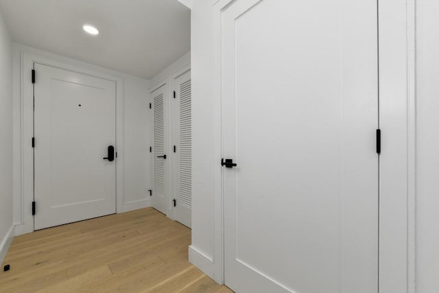50 Leo M Birmingham Pkwy Unit 501, Boston, MA 02135 - hall with light wood-style flooring and recessed lighting