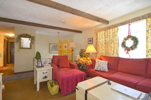 living room with beamed ceiling, carpet flooring, and a textured ceiling