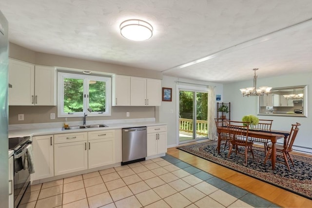 kitchen with range with electric cooktop, dishwasher, sink, white cabinets, and a notable chandelier