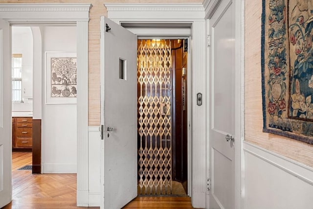 doorway featuring light parquet flooring