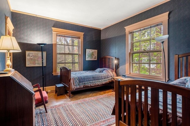 bedroom with multiple windows and ornamental molding