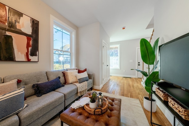 living room with light hardwood / wood-style floors