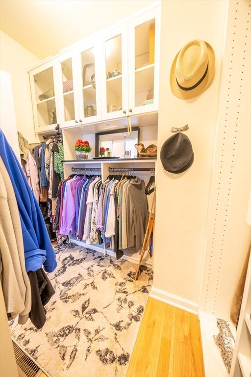 23 Kendall Ct Unit 23, Bedford, MA 01730 - walk in closet featuring wood finished floors