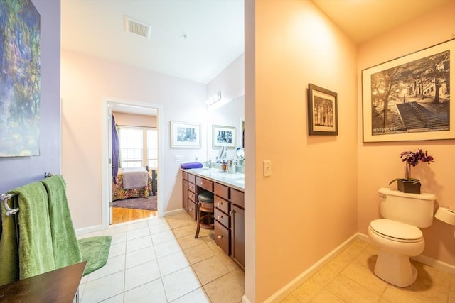 23 Kendall Ct Unit 23, Bedford, MA 01730 - ensuite bathroom featuring visible vents, ensuite bathroom, toilet, vanity, and tile patterned floors