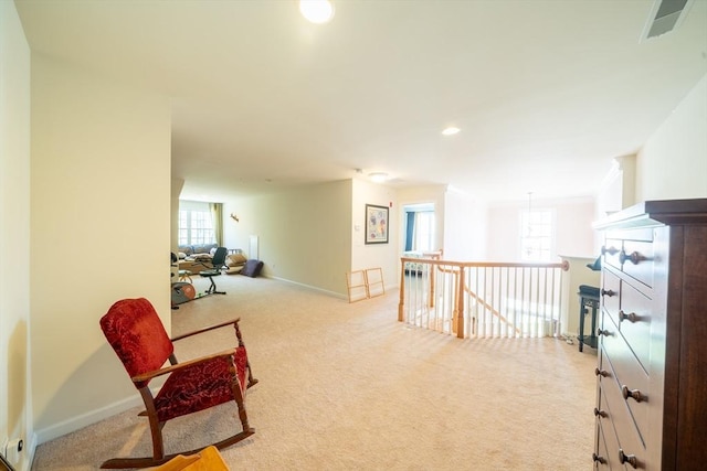 23 Kendall Ct Unit 23, Bedford, MA 01730 - sitting room featuring visible vents, baseboards, an upstairs landing, and carpet floors