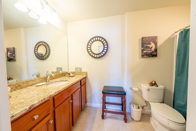 23 Kendall Ct Unit 23, Bedford, MA 01730 - bathroom featuring toilet, tile patterned floors, vanity, and baseboards