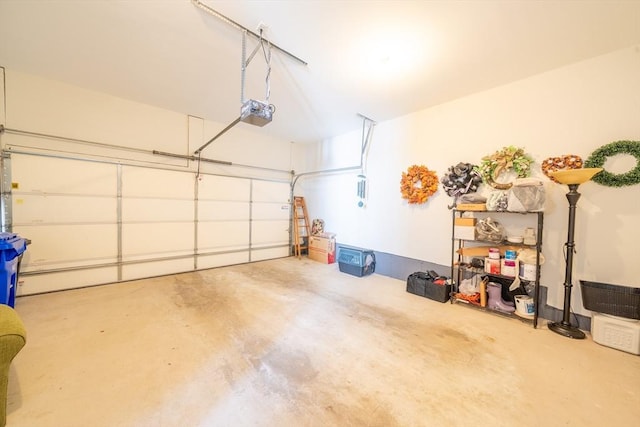23 Kendall Ct Unit 23, Bedford, MA 01730 - garage featuring a garage door opener