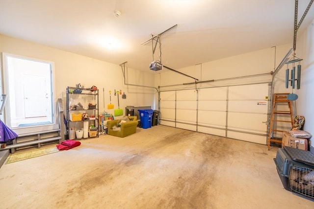 23 Kendall Ct Unit 23, Bedford, MA 01730 - garage featuring a garage door opener