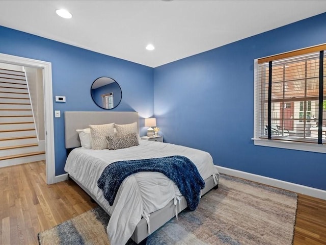 bedroom featuring light hardwood / wood-style floors